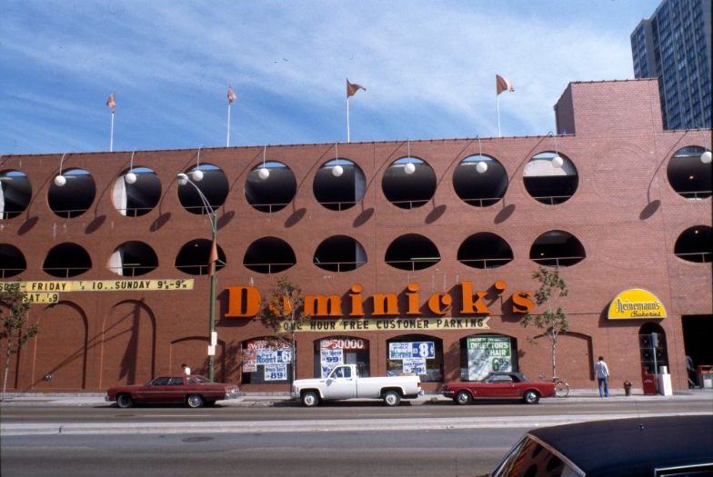 View looking north across West North Avenue at a Dominick's grocery store, part of the Pipers Alley Mall complex, 1978