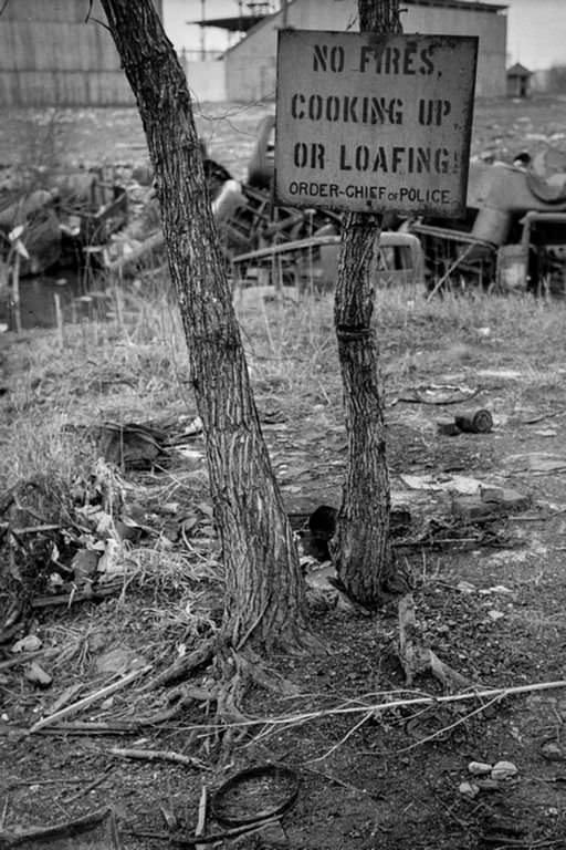 A sign in the river bottoms shacktown in Dubuque. 1940.
