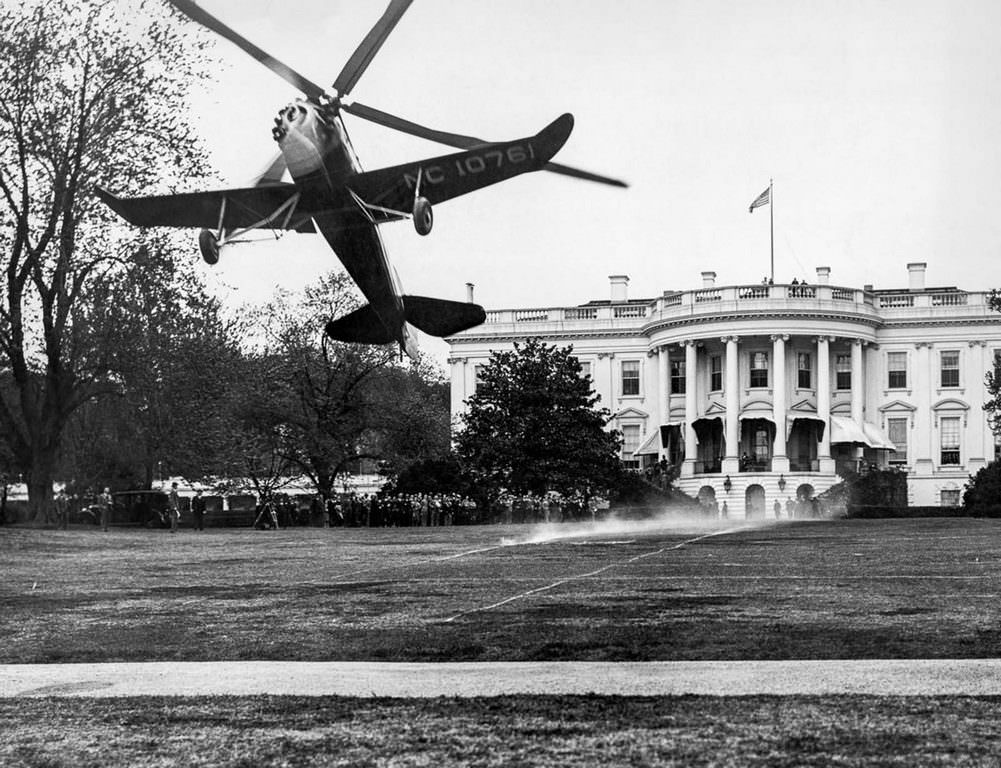 An autogyro takes off after landing on the White House lawn. 1931.