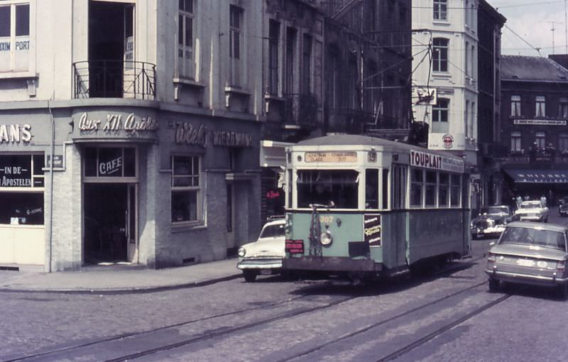 Motorcar 307 on route Nº 15 traversing the Rue de l'Eglise (Church Street) on his way to the South Station (Gare du Sud), Charleroi.