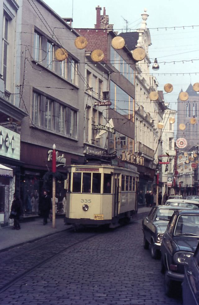 Motorcar 331 on route Nº 4 passing a bridge, Ghent.