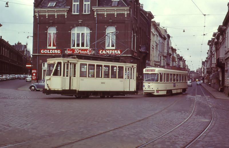 Motorcar 5858 + PCC car 2012 (brake-down) on tow near the workshop and depot Grotehondstraat, Antwerp.