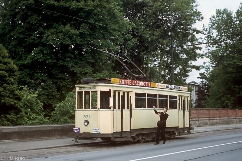 Swinging the bow collector at the terminus of line 20 near Ghent, Melle, 1973.