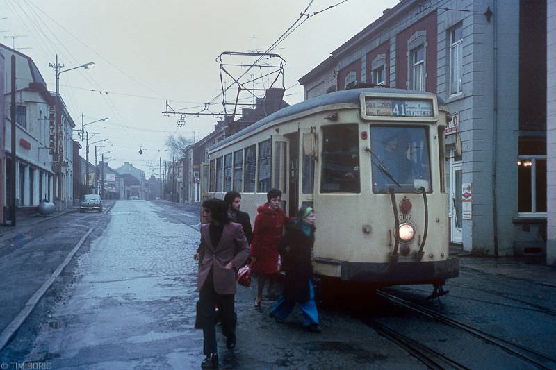 On a bleak and drizzly morning when the street lights stay on burning, Souvret. circa 1975