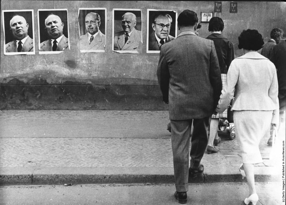 Posters of Nikita Khrushchev, Walter Ulbricht, Wilhelm Pieck and the East German Premier Otto Grotewohl on an East Berlin Wall, 28th August 1961.
