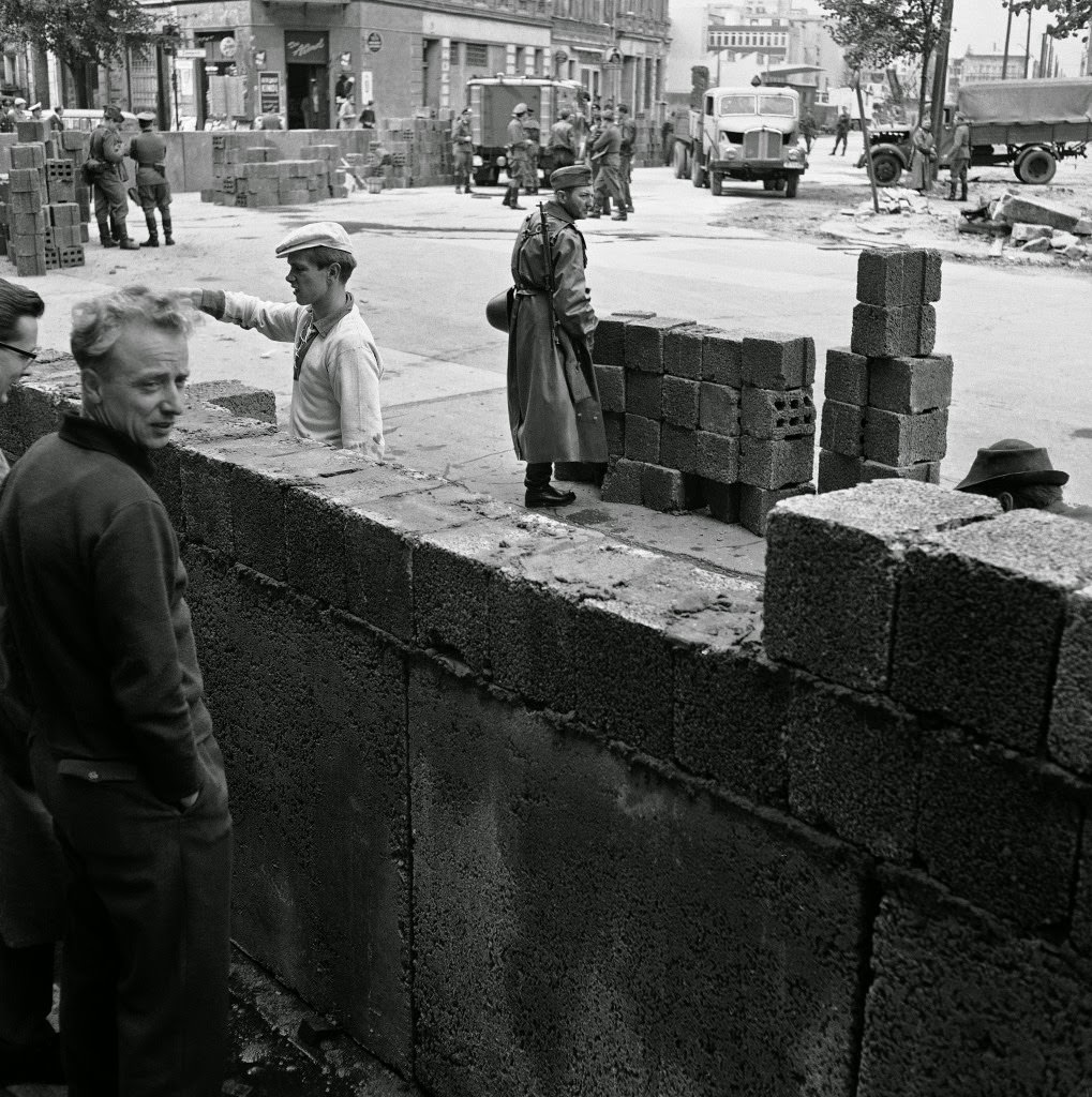 East German build cinder block wall in East Berlin as the divided city continued in stage of unrest August 18, 1961.