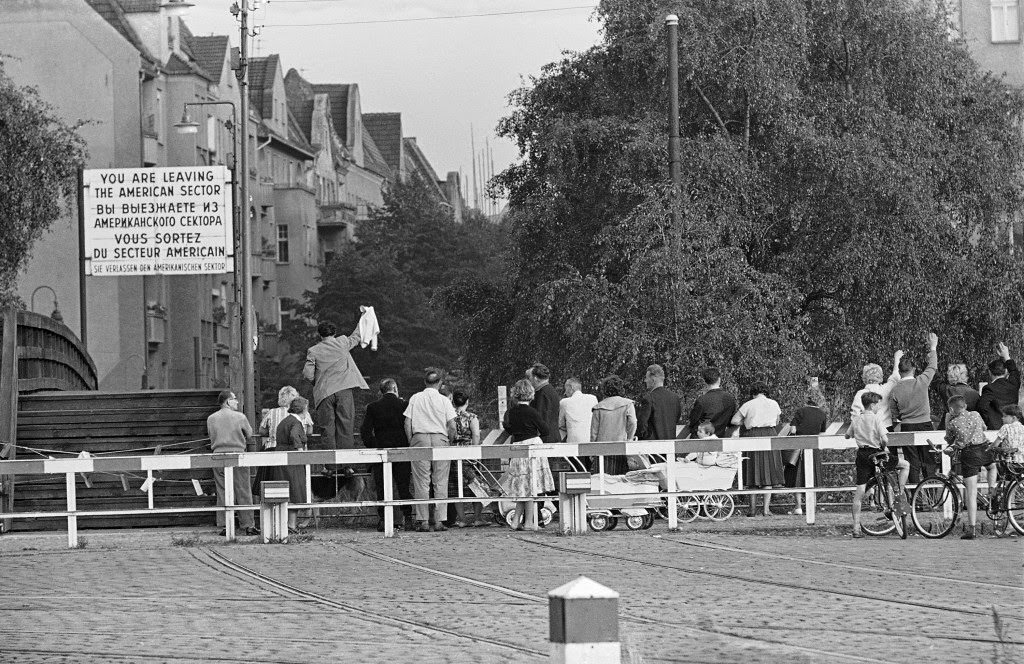 Border situation West Berliners looking and waving to friends living in East Berlin at formerly wiener bridge in Kreuzberg district Sept. 6, 1961.