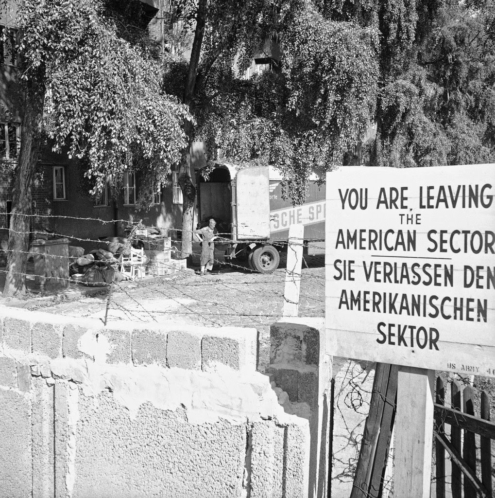 Behind concrete wall with barbed wire east Berliners removing their furnitures in Berlin Sept. 20, 1961.