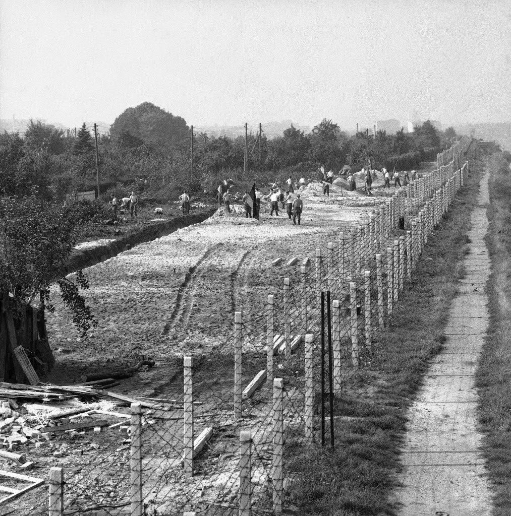 East Berlin laborers work on “Death Strip” which communist authorities created on their side of the border in the divided city on Oct. 1, 1961.