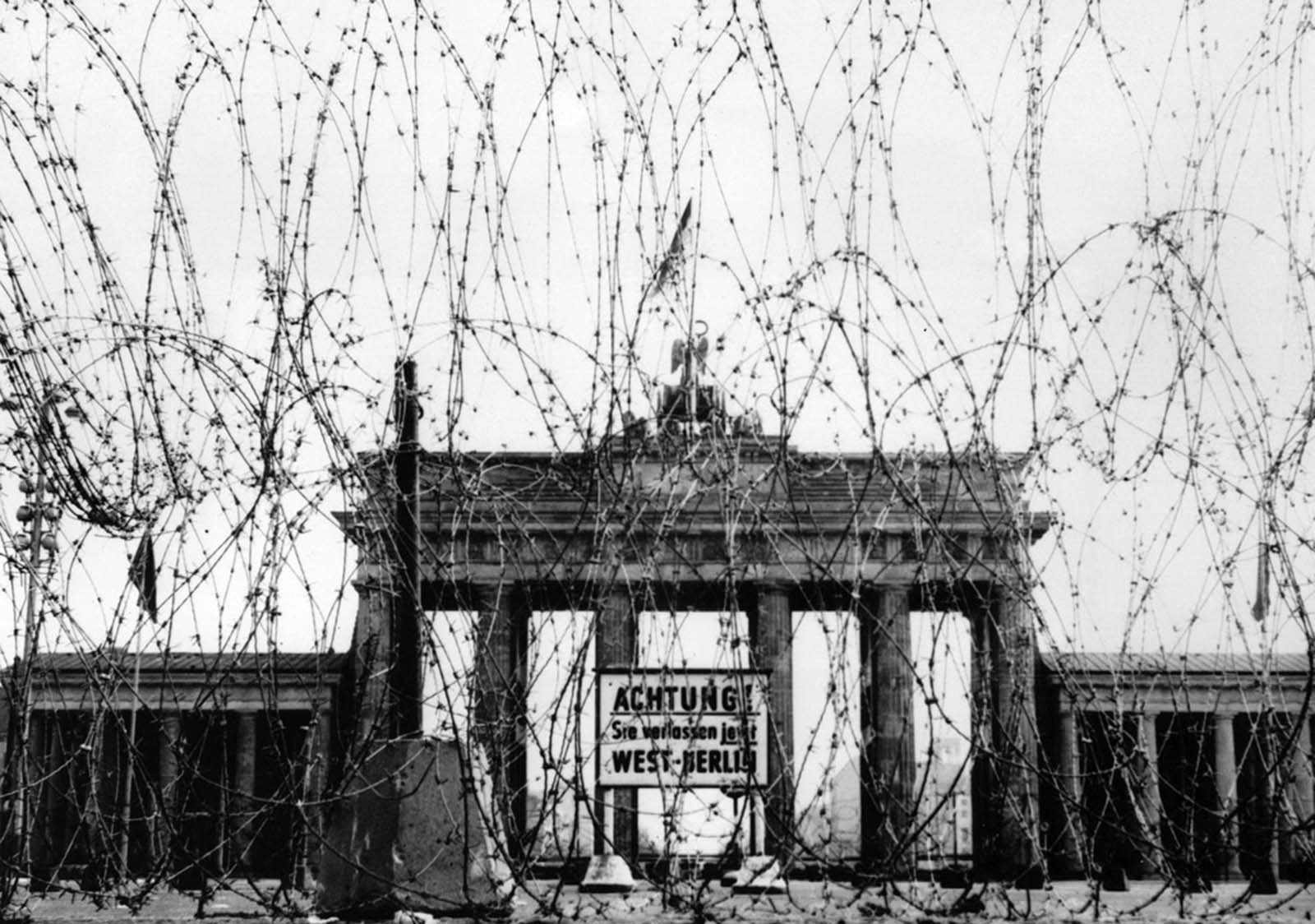 Barbed wire on the west side of the Brandenburg gate, put up as a “safety measure” by the British, photographed in November 1961.