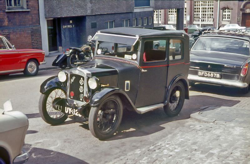 A fabric body Austin Seven parked up in Fleet Street off Newhall street in Birmingham