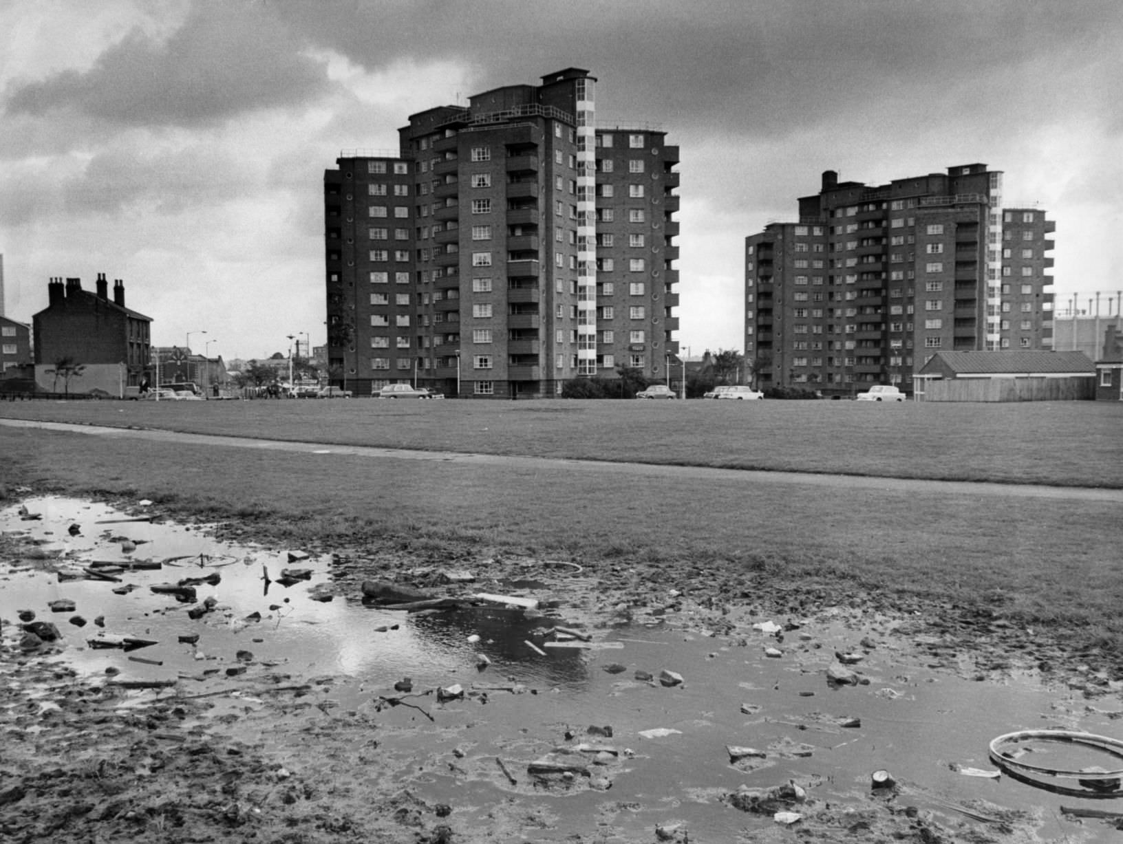 Duddeston tower blocks, Birmingham's first multi-storey flats seen beyond the children's play area in Duddeston Manor Road, 1st September 1968.