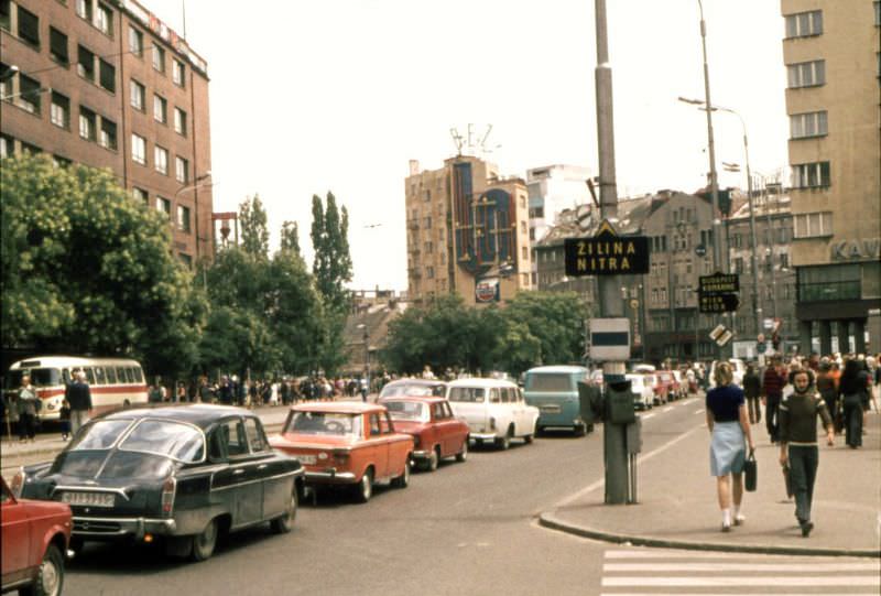 Two Tatra in traffic city center, 1975