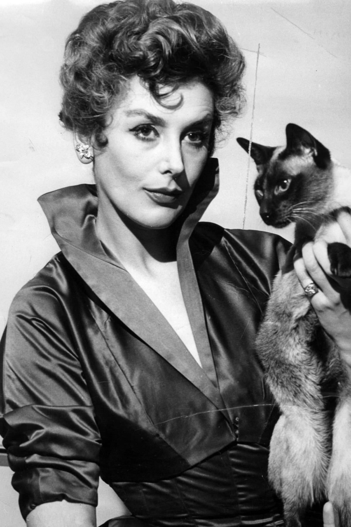 Actress Kay Kendall’s with her cat, 1958.