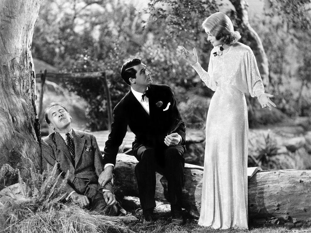 Constance Bennett wiht Roland Young and Cary Grant in a scene from the movie Topper.