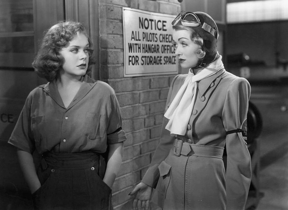 Constance Bennett with Alice Faye in a scene from the film 'Tail Spin', 1938.