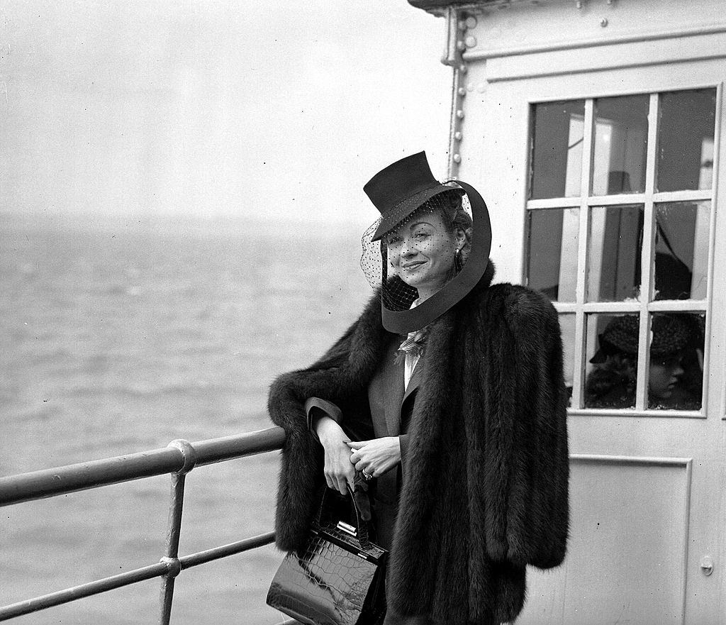 Constance Bennett upon arrival at Southampton aboard the liner ,Normandie from New York, 1939.