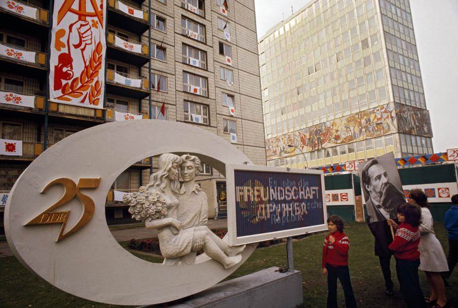 Celebrating 25 years of the GDR on the Karl-Marx-Allee. East Berlin, 1974.