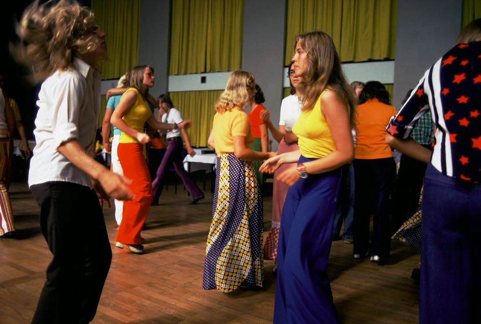 Young women dancing in a disco in Mecklenburg. East Germany, Mecklenburg, 1974.