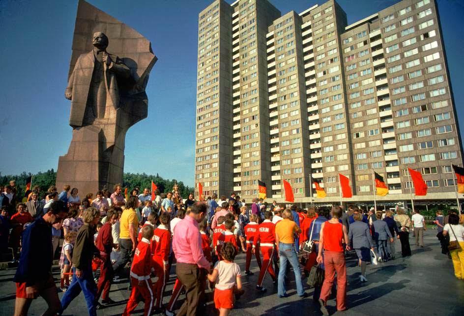 Lenin statue in front of new apartment blocks. East Berlin, 1974