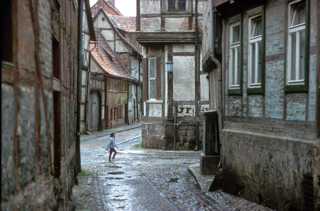 Framework houses and cobblestone roads in an old town in the Harz mountains. Quedlinburg, 1974