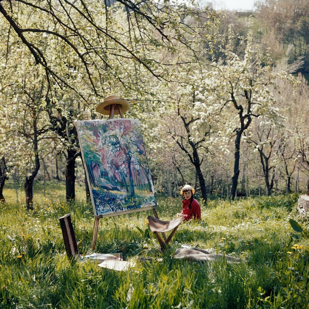 A girl with a painting in the garden, opio, 1962.