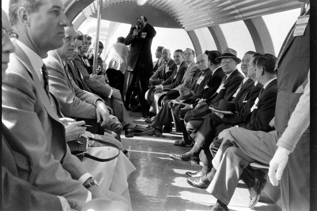 People sitting on a monorail train, Houston, Texas, February 1956.