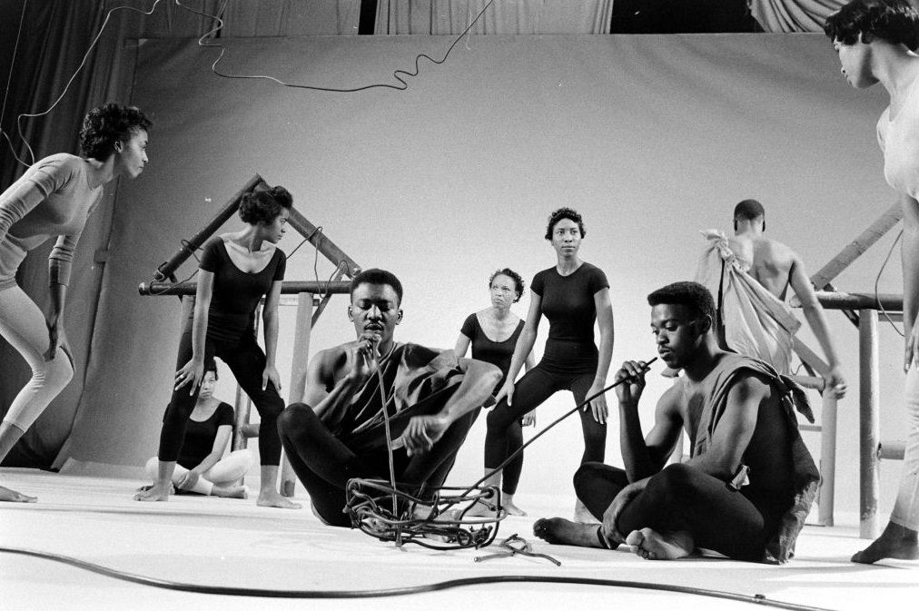 Dancers performing an educational dance on a stage at the University of Houston, 1956.