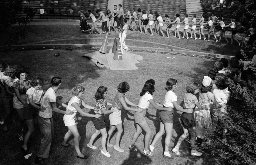Cheerleaders lining up at a cheerleaders school in Sam Houston State University, 1950.