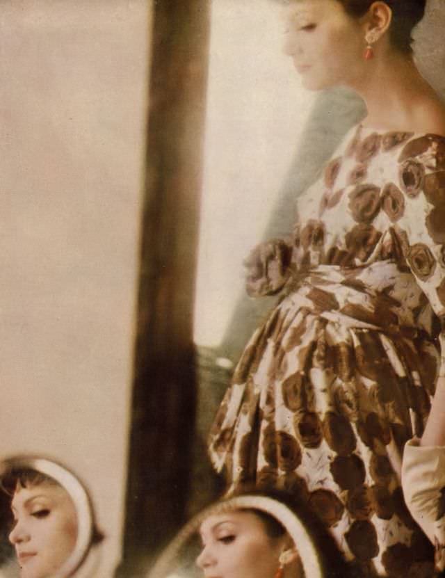 Isabella Albonico in brown and white floral print dress of twilled silk with wide neckline and low back by Larry Aldrich. Harper's Bazaar, March 1959