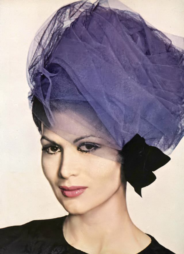Isabella Albonico in violet tulle hat held together with black velvet bow by Gustave Tassell. Vogue, September 1, 1960