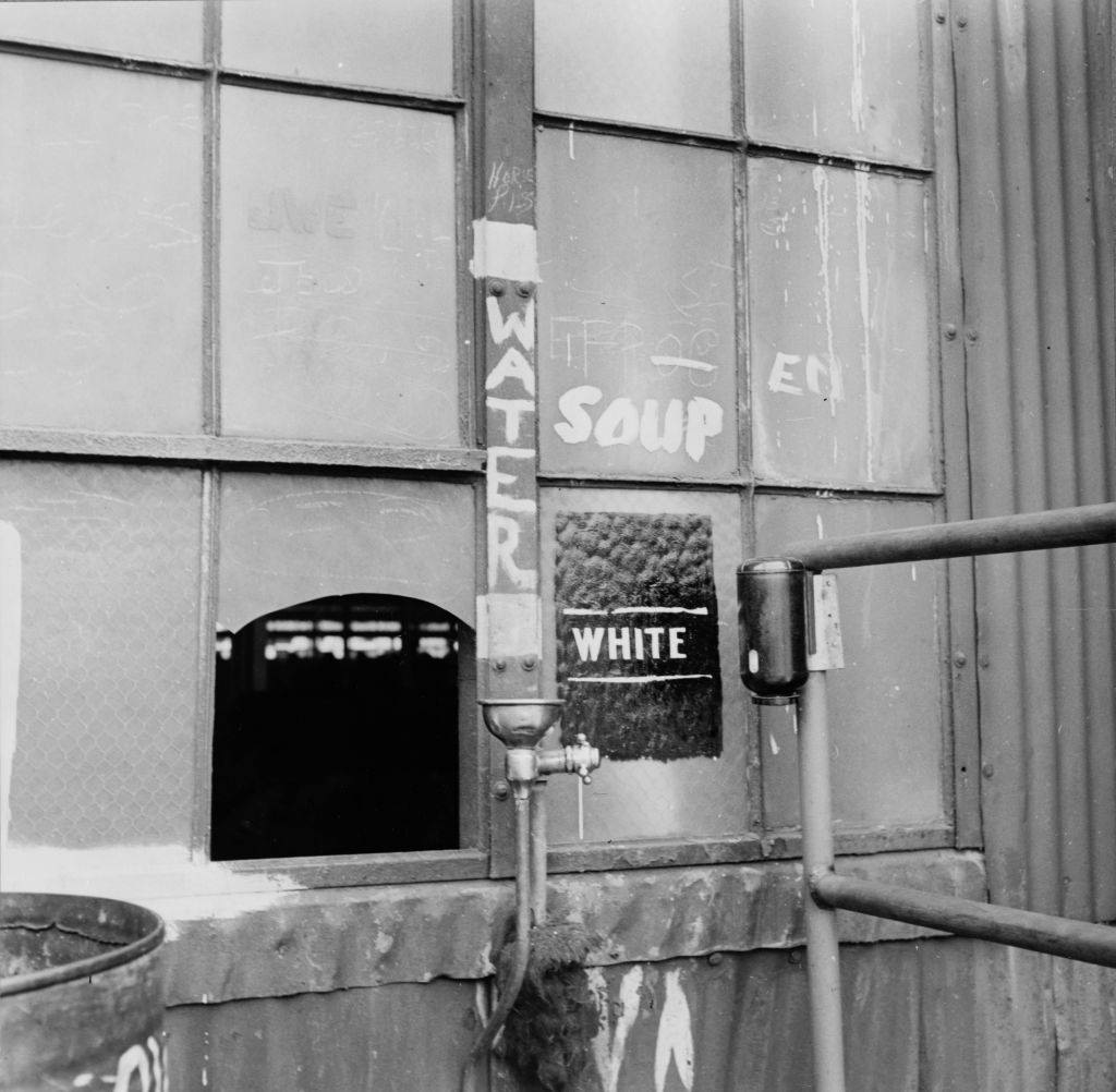 A drinking fountain, labeled 'White,' at the Bethlehem-Fairfield shipyards, Baltimore, 1943.