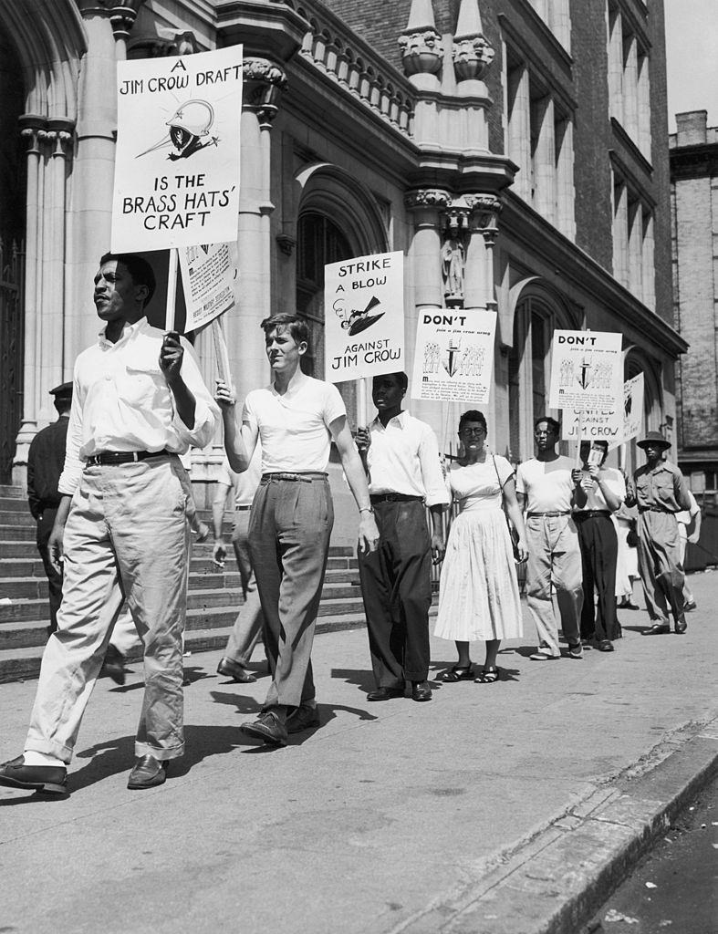 Members of the Campaign to Resist Military Segregation picket registration for America's postwar draft at Haaron High School, New York City, 30th August 1948.
