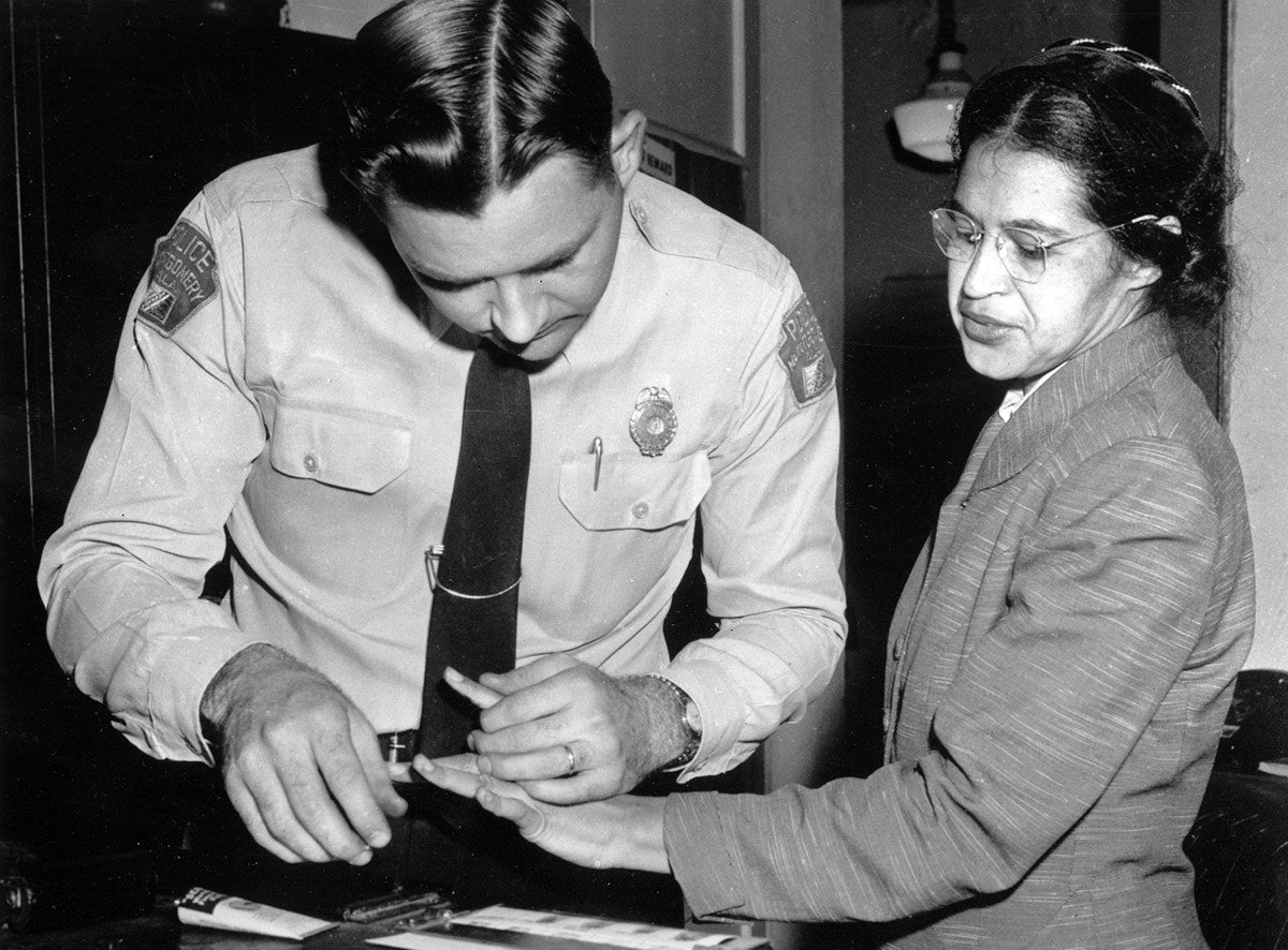 Rosa Parks is fingerprinted by a police officer in Montgomery, Alabama, on Feb. 22, 1956, two months after refusing to give up her seat on a bus for a white passenger on Dec. 1, 1955.