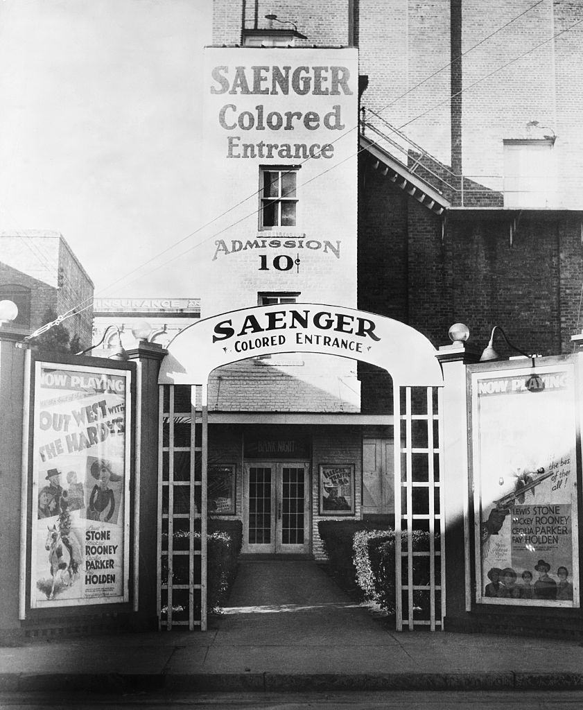 Jim Crowism in Florida movie house, rear entrance for colored people. Pensacola, 1930.