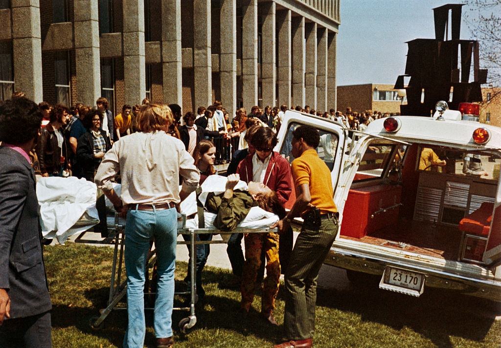 Sudent on a stretcher is wheeled to an ambulance, May 4th 1970.
