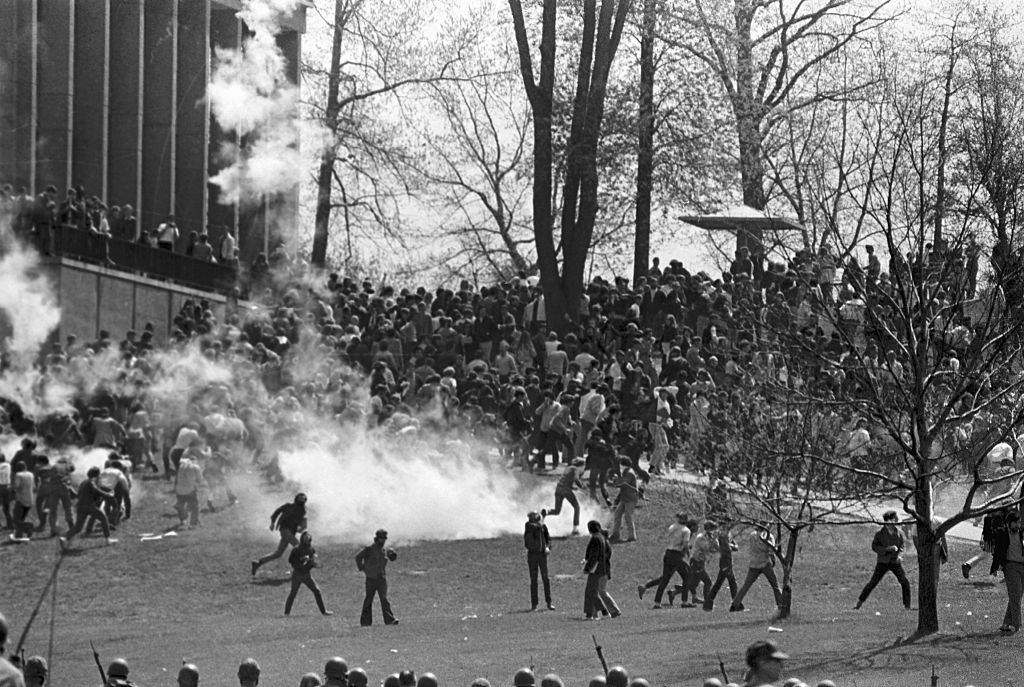 Guardsmen fired a barrage of tear gas into a crowd of demonstrators on the campus of Kent State University.