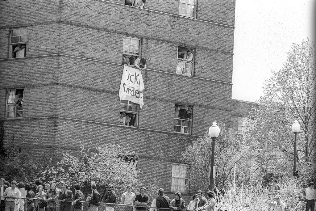 Students hang a banner out of a dorm window during a student antiwar protest, Kent, Ohio, May 4, 1970.