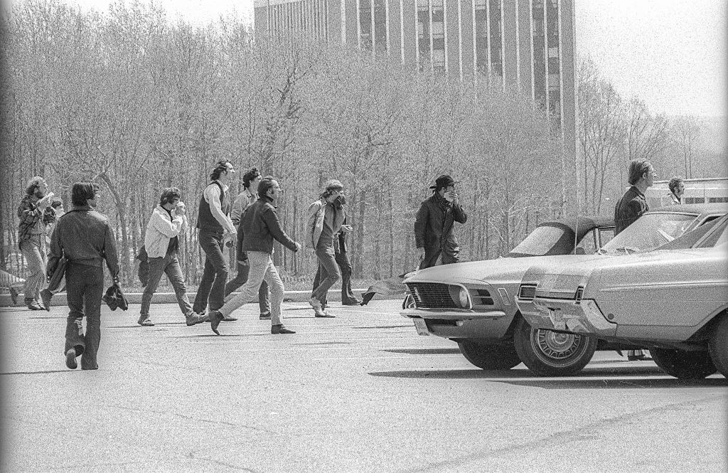 A crowd of Kent State University students as they cross a parking lot during an antiwar demonstration, Kent, Ohio, May 4, 1970.