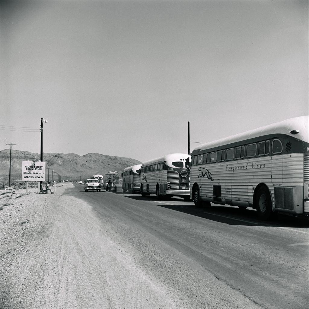 Greyhound Lines buses going to the Nevada Test Site, Nevada, 1955