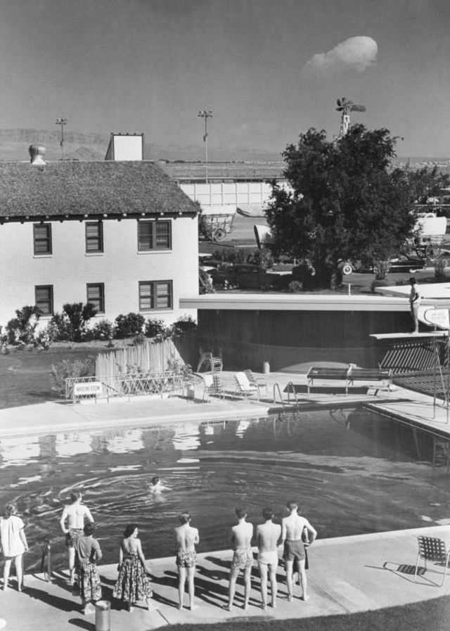 Guests at the Last Frontier hotel in Las Vegas watch the mushroom from a detonation about 75 miles away. May 8, 1953.