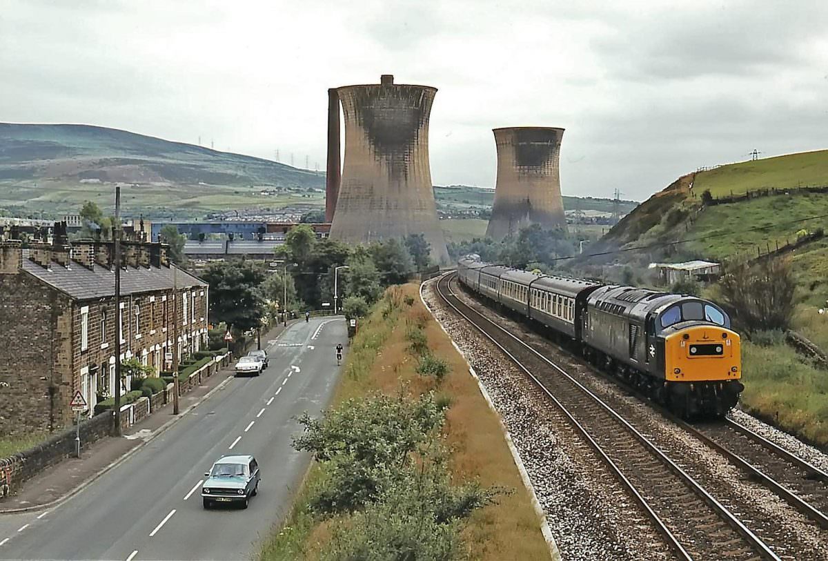 40154 passes Hartshead power station on the climb from Stalybridge to Standedge with the 13:42 SO Llandudno – York on 14th July 1979.