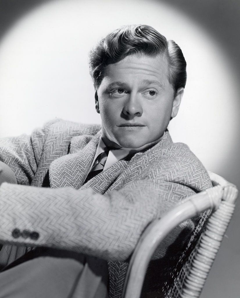 Mickey Rooney posing for a portrait.