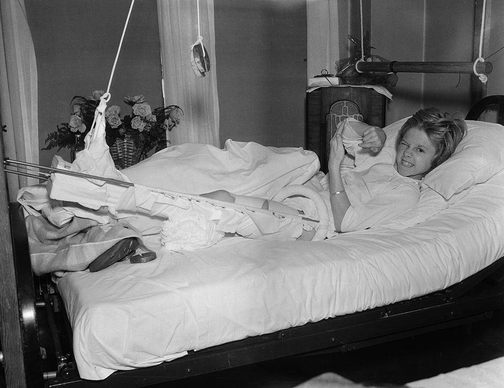 Mickey Rooney in Hospital Bed with Broken Leg, 1935.