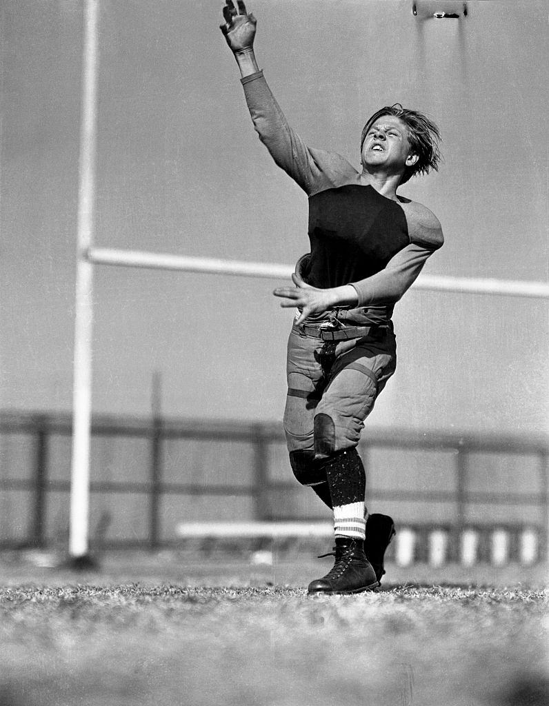 Mickey Rooney throwing Football, 1935.
