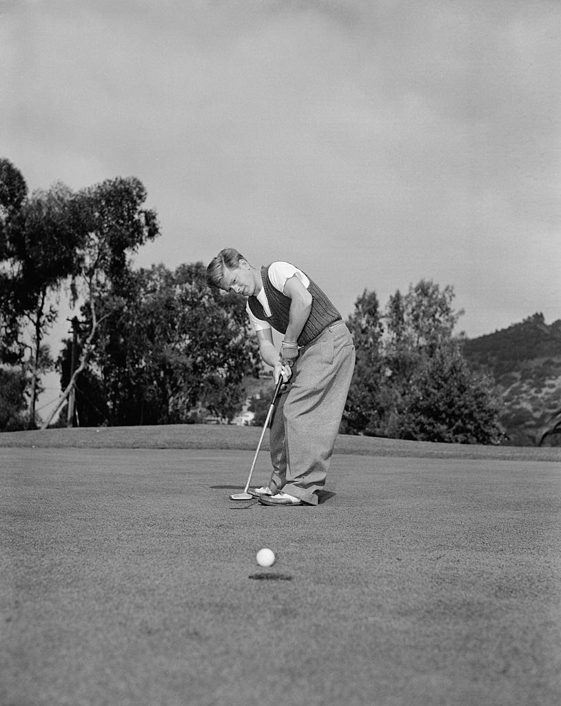 Mickey Rooney playing Golf.