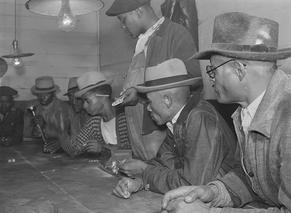 Gambling with their cotton money in a juke joint outside of Clarksdale. Mississippi Delta, November 1939