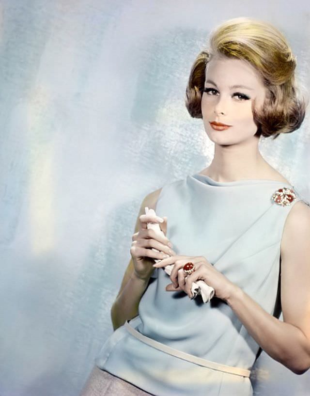 Monique Chevalier in pale blue jersey blouse, 1961