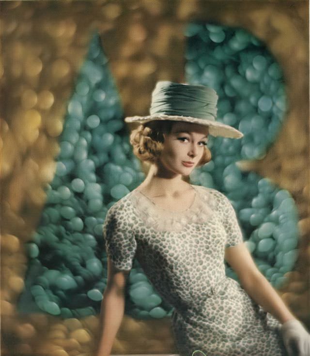 Monique Chevalier in rayon crêpe dress in miniature apple print, Vogue. April 1, 1962
