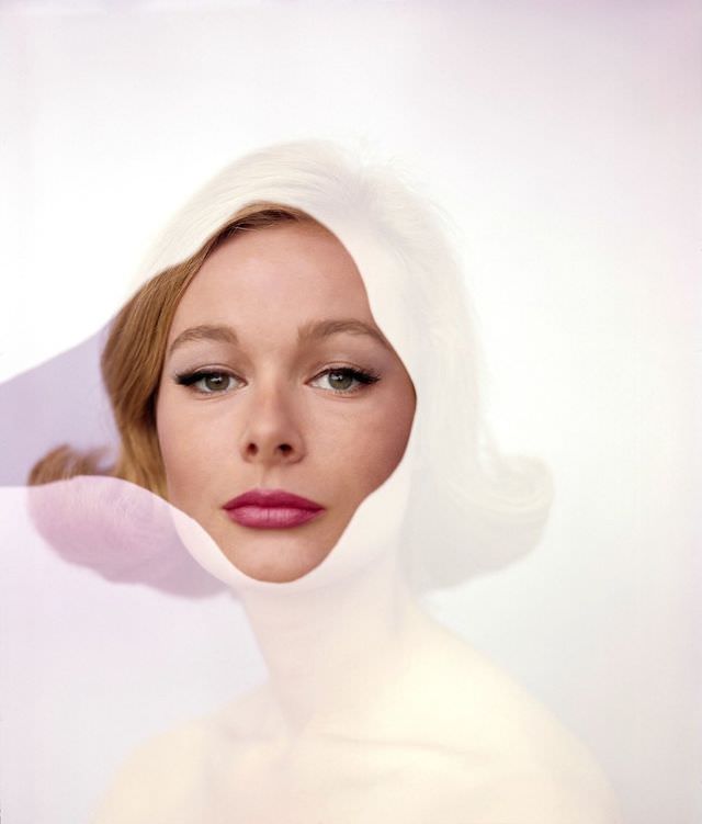 Monique Chevalier's face in cut-out, photo by Tony Vaccaro, Home Companion, 1965